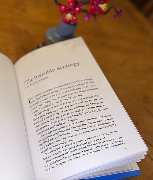 shy guy sitting and watching group talk